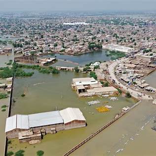 A swollen river has broken through embankments, flooding farmland in Punjab during the 2025 monsoon. Pakistan floods 2025, global warming intensified floods, climate change Pakistan, flood crisis Pakistan, monsoon extremes PakistanPunjab river flooding 2025 Pakistan — swollen river inundating farmland