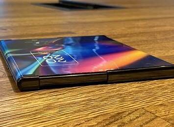 Rollable phone extending its screen smoothly from compact to wider display