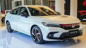 The 2019 Honda City RS (current generation) shown at an auto show – its sporty design language is the basis for the 2026 facelift’s updated look. The Honda City 2026 will adopt a bolder front grille, sleeker LED headlamps, and other styling cues influenced by Honda’s global models like the Civic